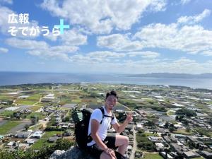 日本1周を達成した城間さんの写真