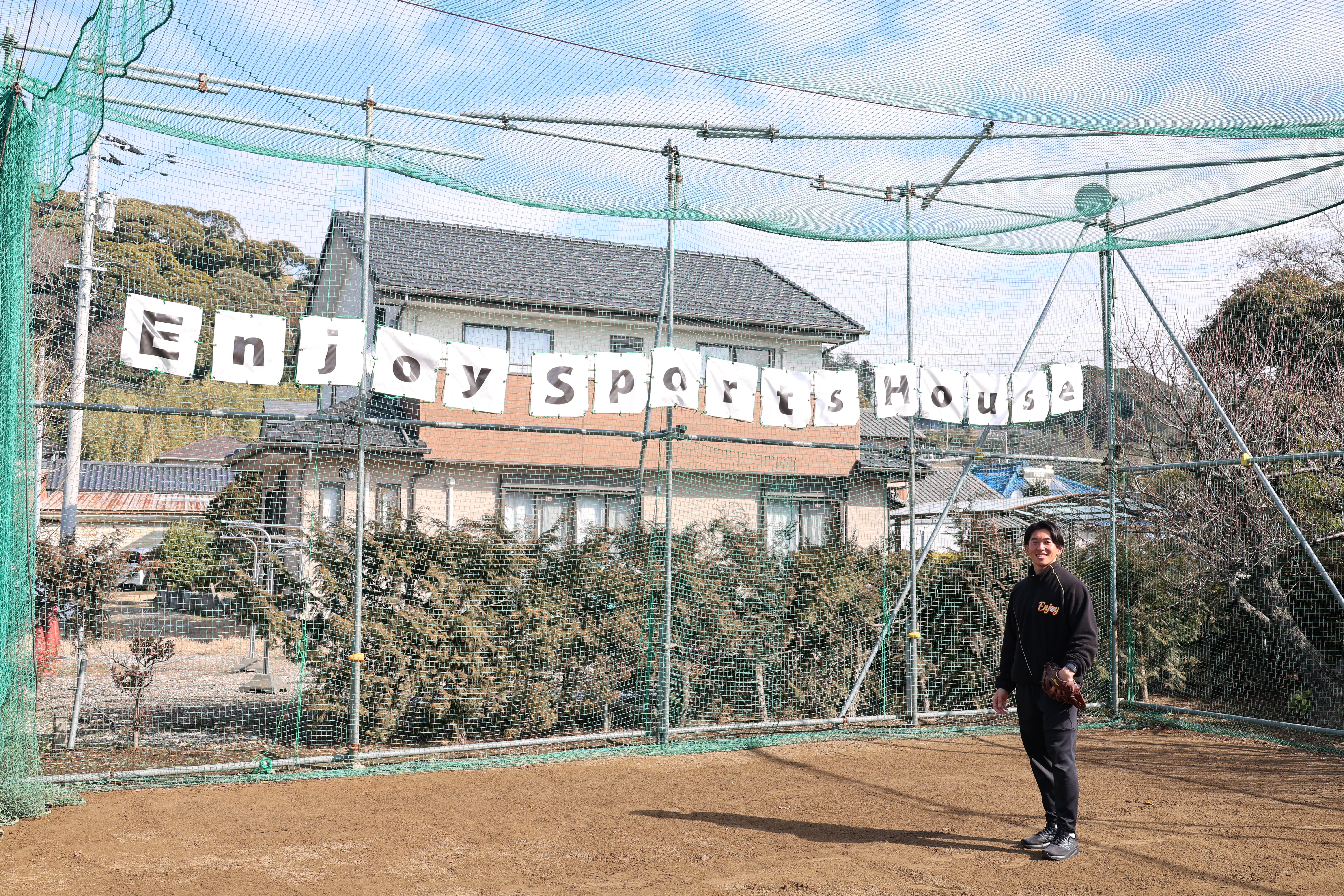 練習場の前での写真